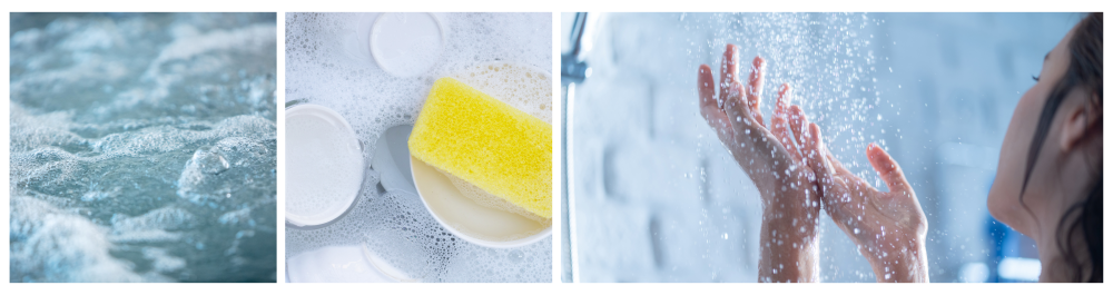     Close-up of water in a warm bath, illustrating a relaxing environment.    Dishes and bowls soaking in soapy water in the sink, showcasing the need for warm water in cleaning.    Woman's hands under running hot water in the shower, emphasizing the importance of maintaining a hot water tank for daily use. Modern Air and Water recommends descaling hot water tanks monthly, but this maintenance step is often overlooked by homeowners.